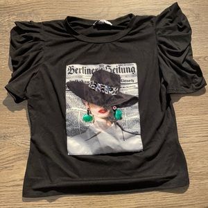 Graphic black shirt with puffy sleeves